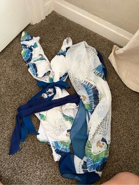 White One-Piece Swimsuit with Blue & Green Print and Navy sarong skirt